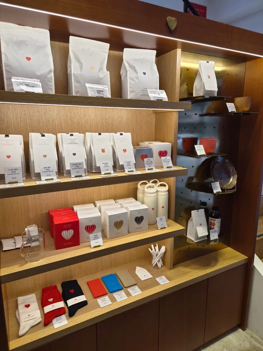 Goods and coffee bean products displayed on a wall