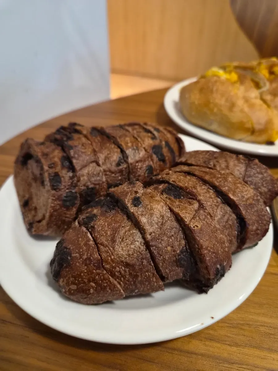 Three kinds of bread on a 3rd floor table