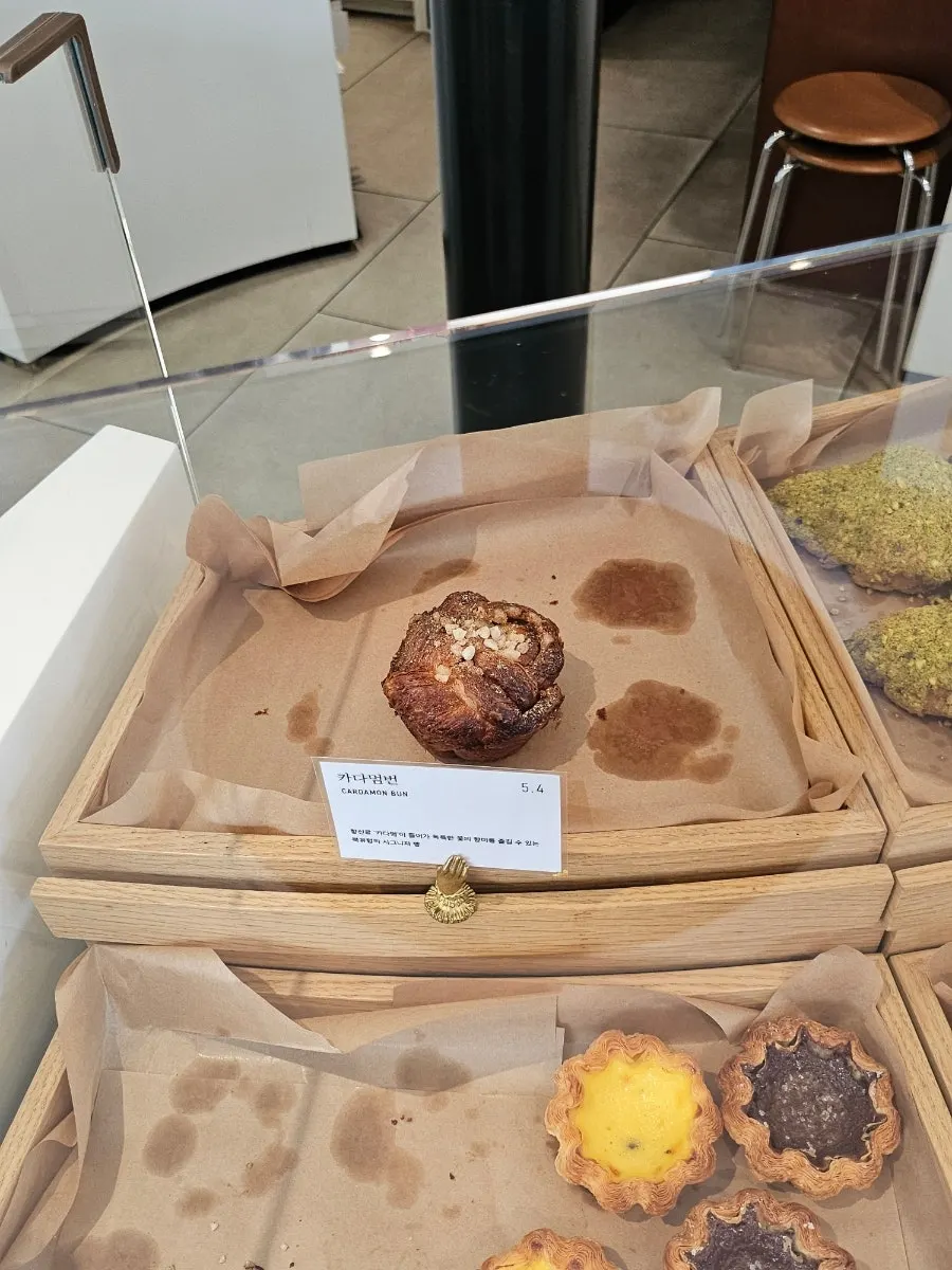 Bakery counter with cardamom buns displayed