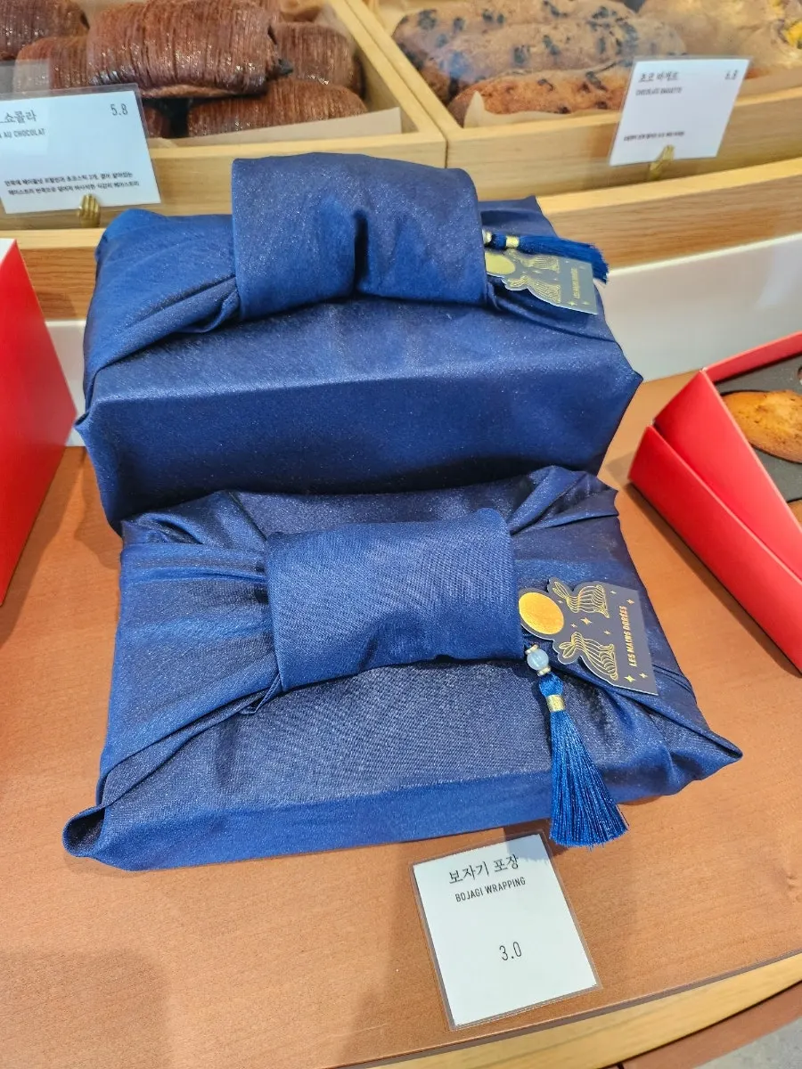 Dessert gift wrapped in navy bojagi cloth