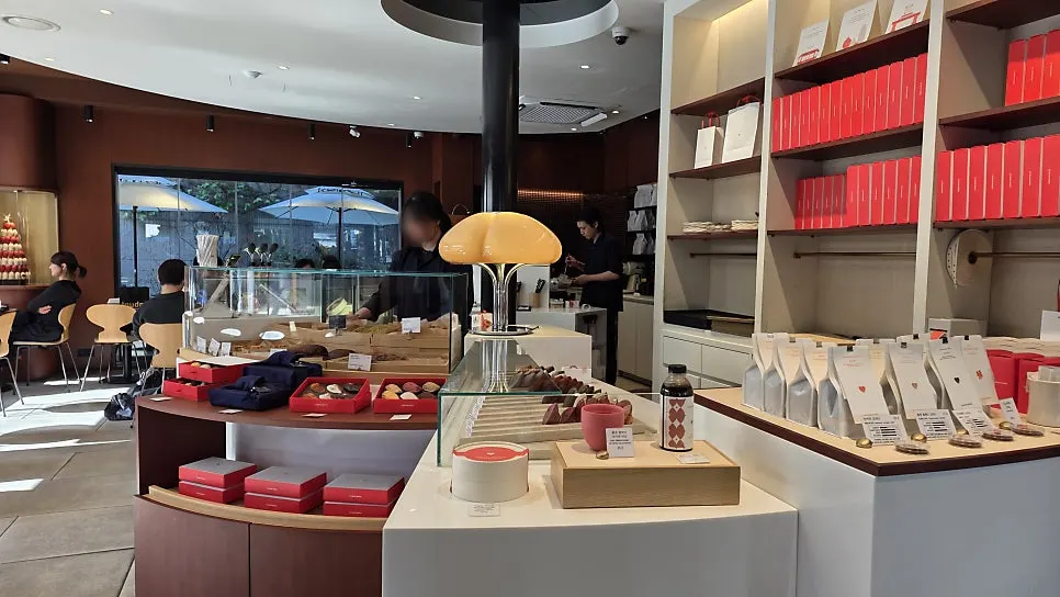 Red dessert gift packages displayed on the wall