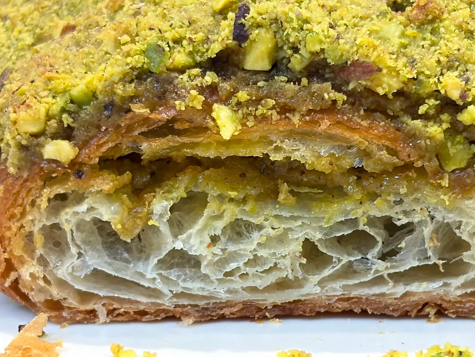 Cross-section of the pistachio croissant cut in half