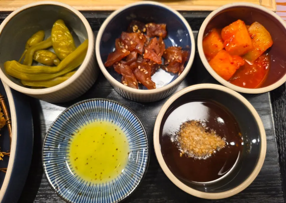 Generous side dishes served with the tonkatsu