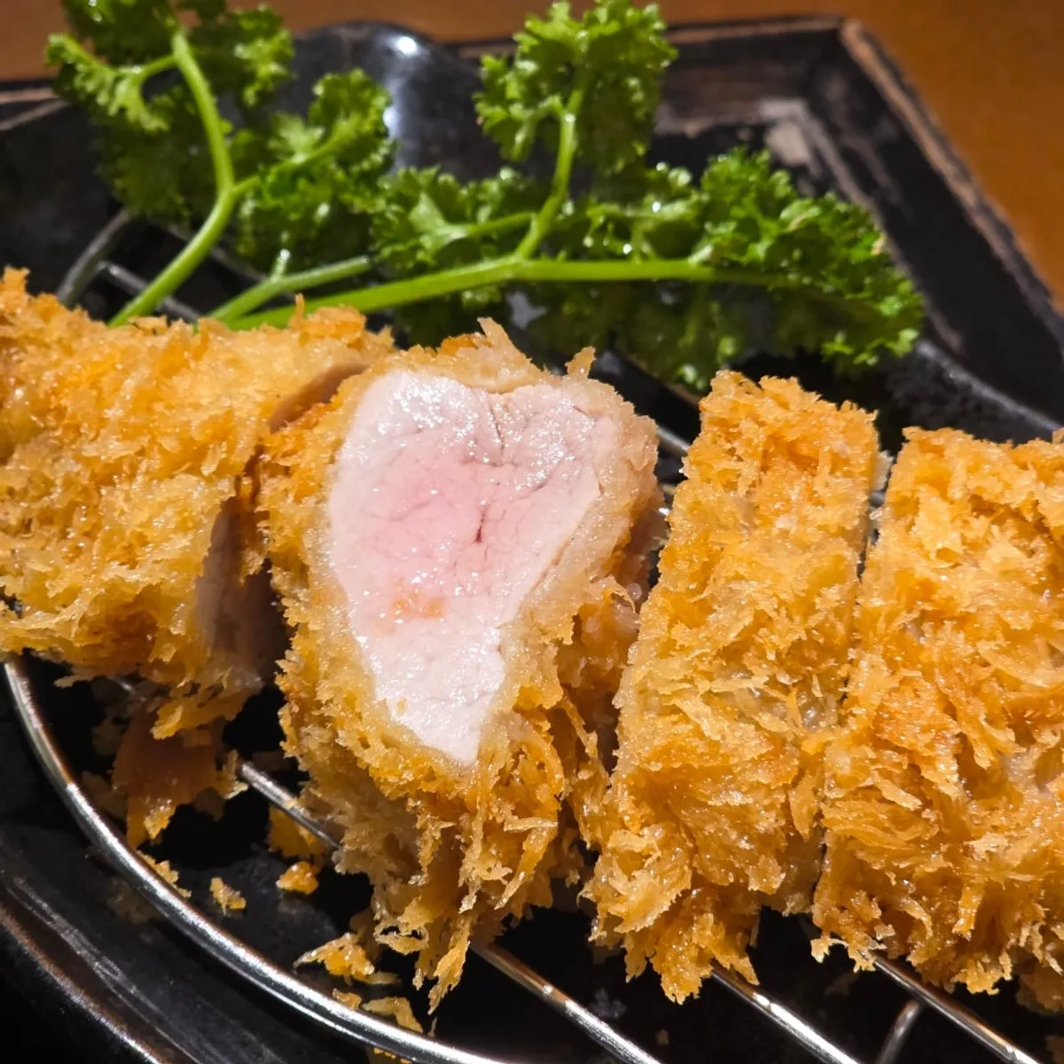 Tonkatsu table spread at Riae Premium Olympic Park Branch