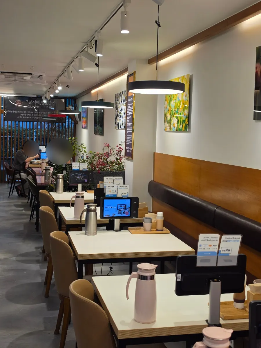 Interior tables at Riae Premium