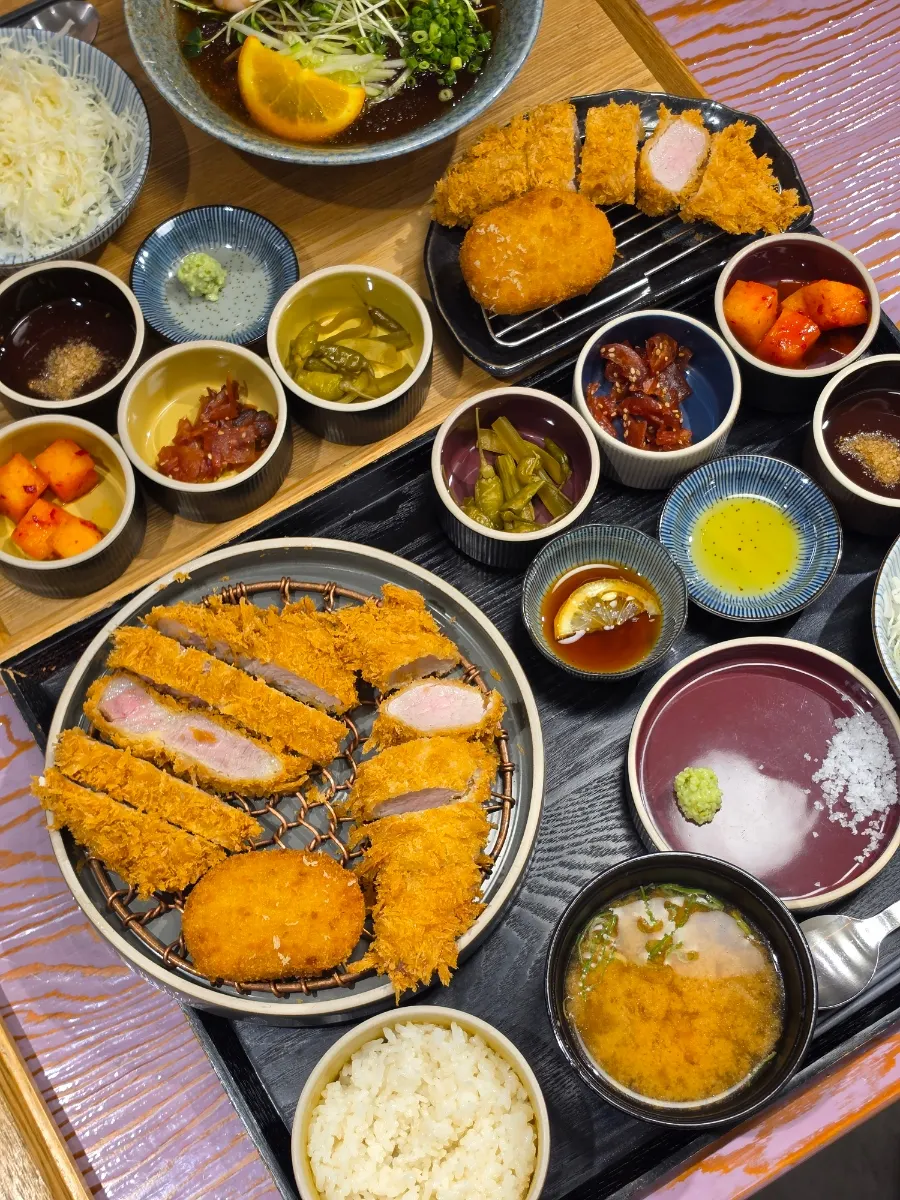 Table spread with special loin katsu set and cold soba set