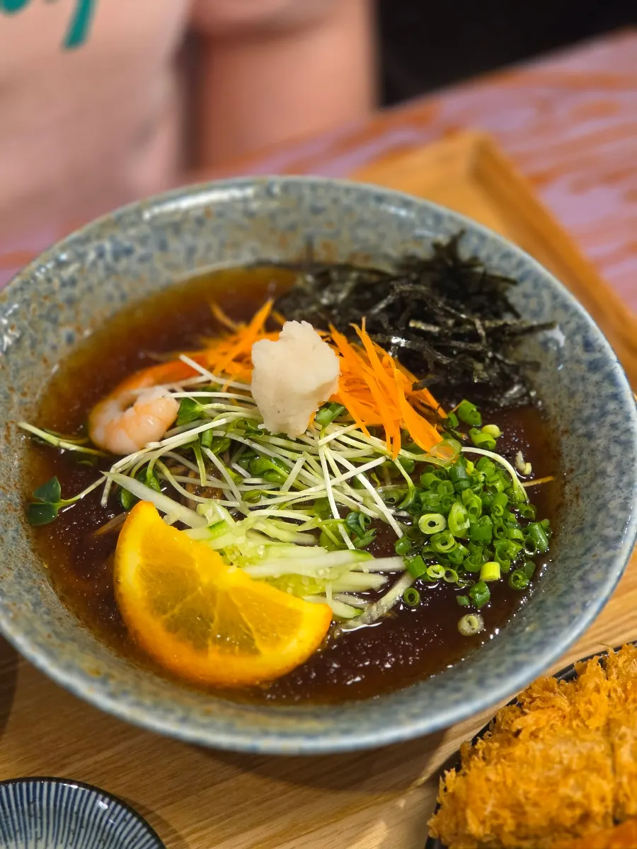 Bowl of cold soba topped with garnishes