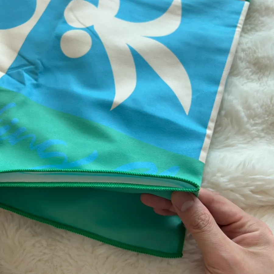 Generously sized green Lifeclue large towel