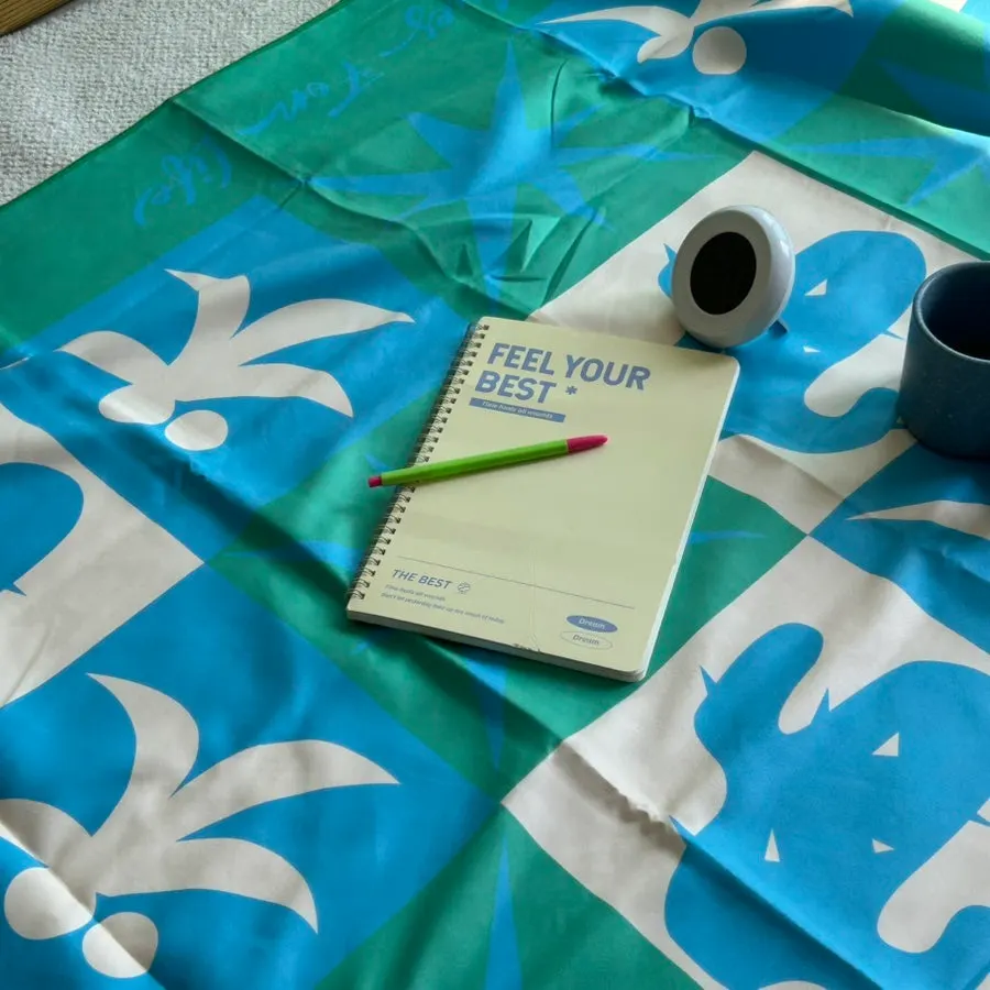 Green Lifeclue towel used for travel and everyday life