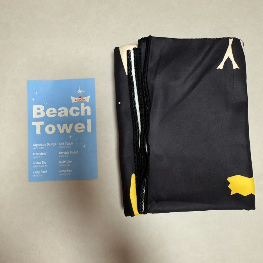 Lifeclue beach towel examined before unfolding