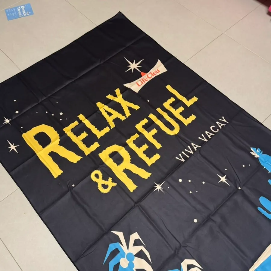 Beach towel print unlike stripes or checks