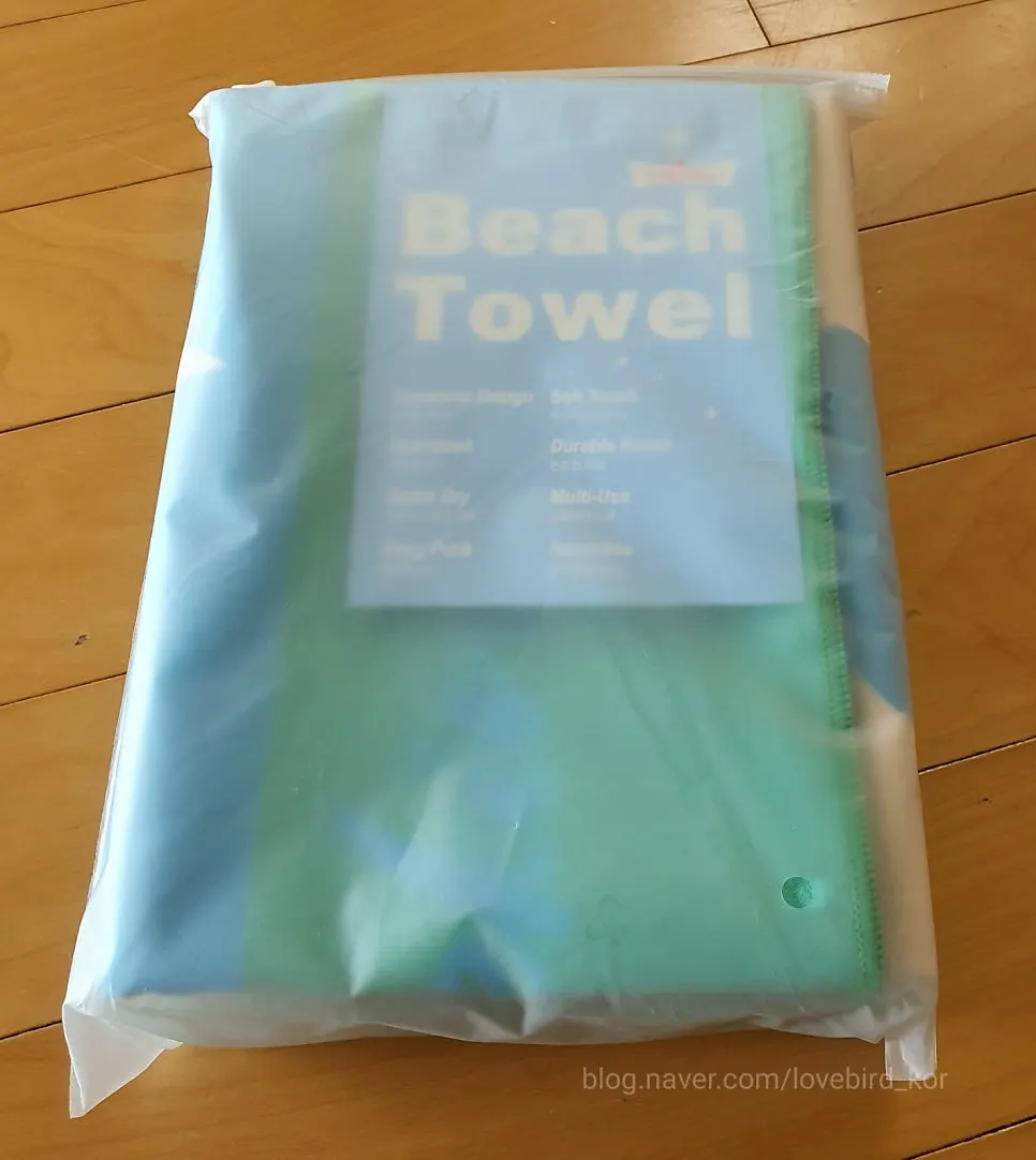 Large Lifeclue beach towel chosen for water activities