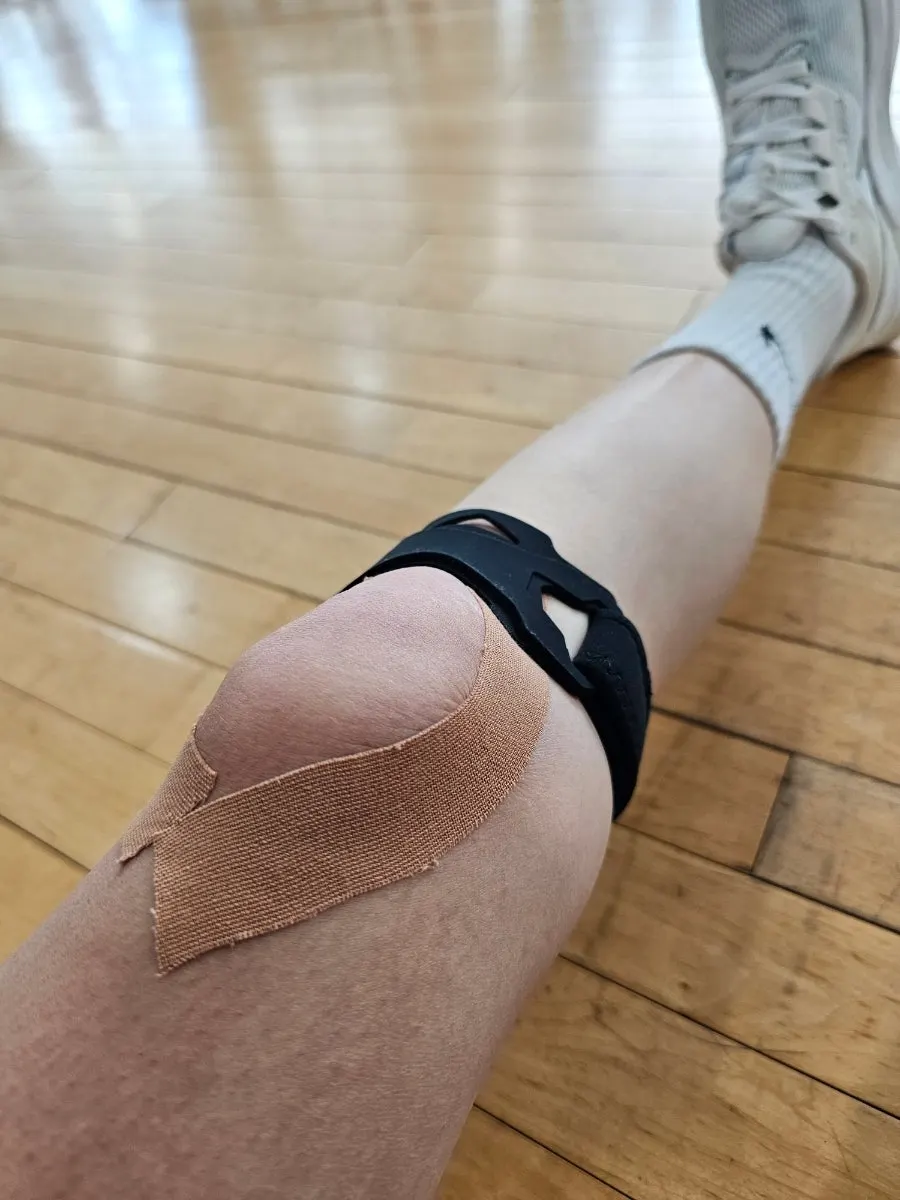 Brace straps adjusted to fit around the knee