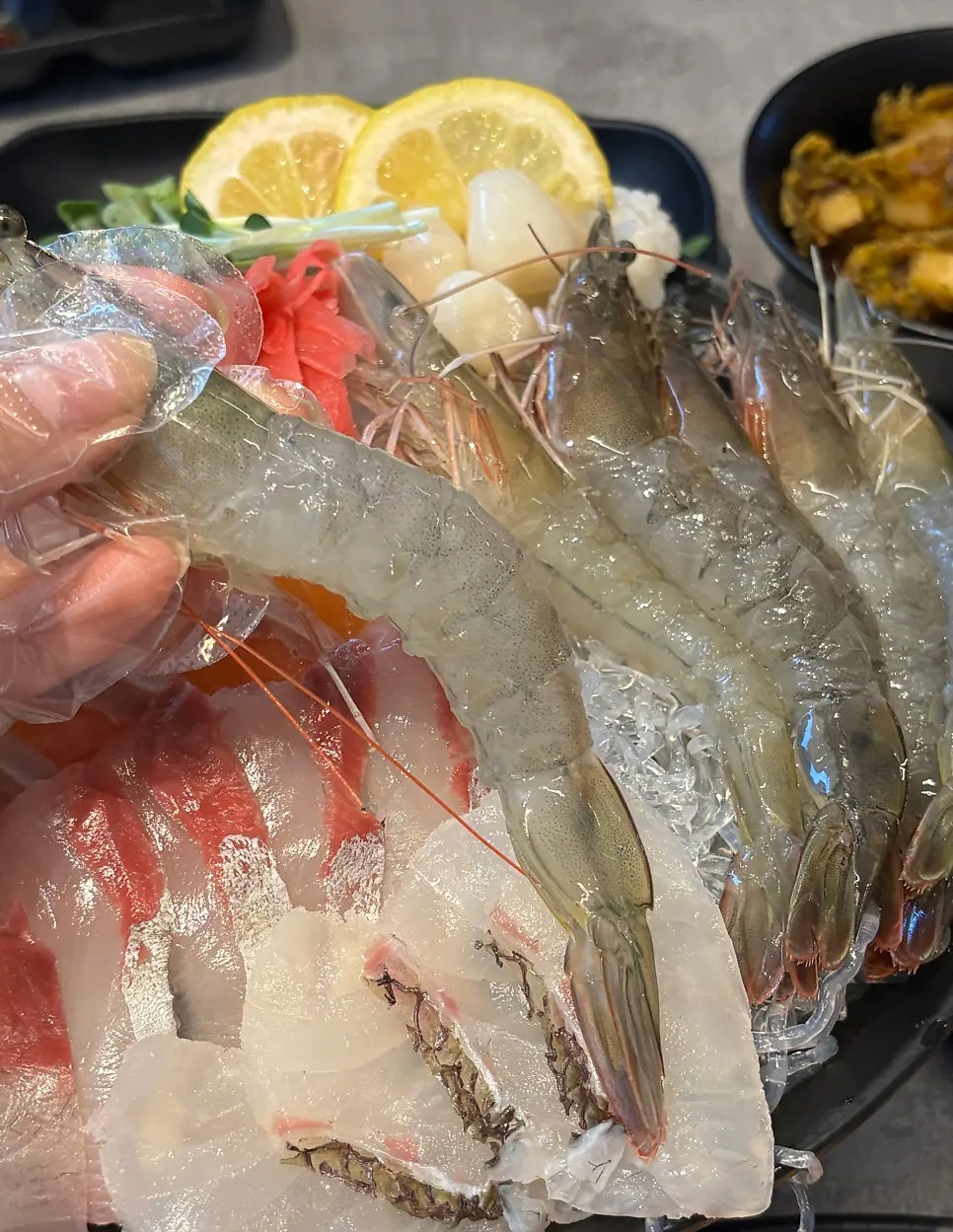 The assorted aged sashimi and live sweet shrimp sashimi small set