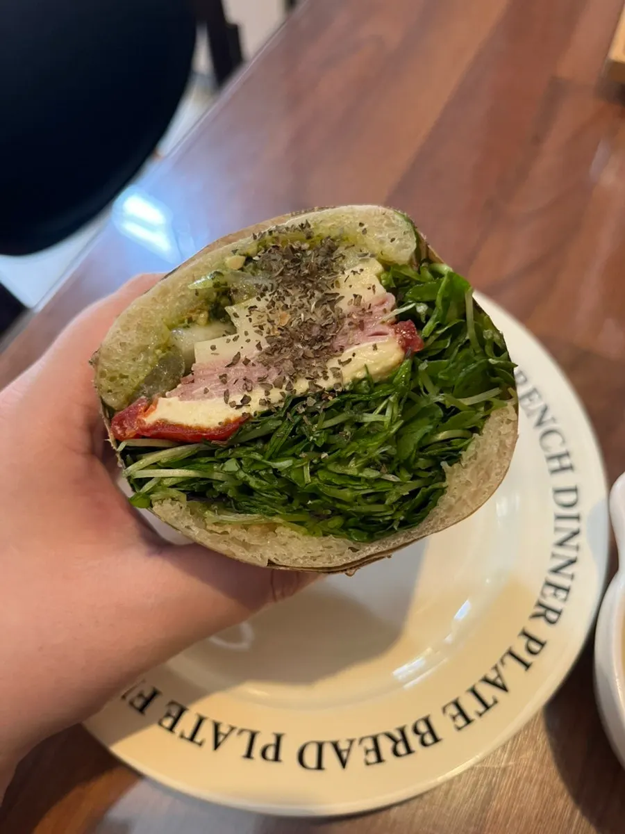 Close-up of the sandwich full of young sprouts
