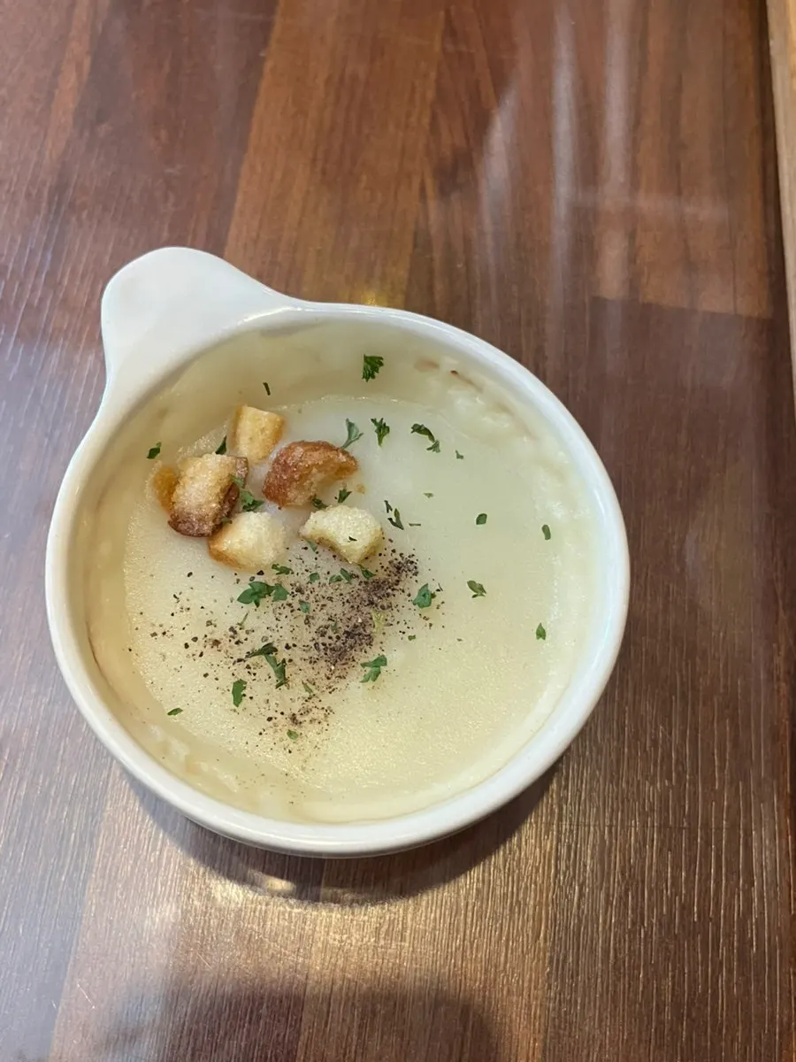 Homemade potato cream soup served warm