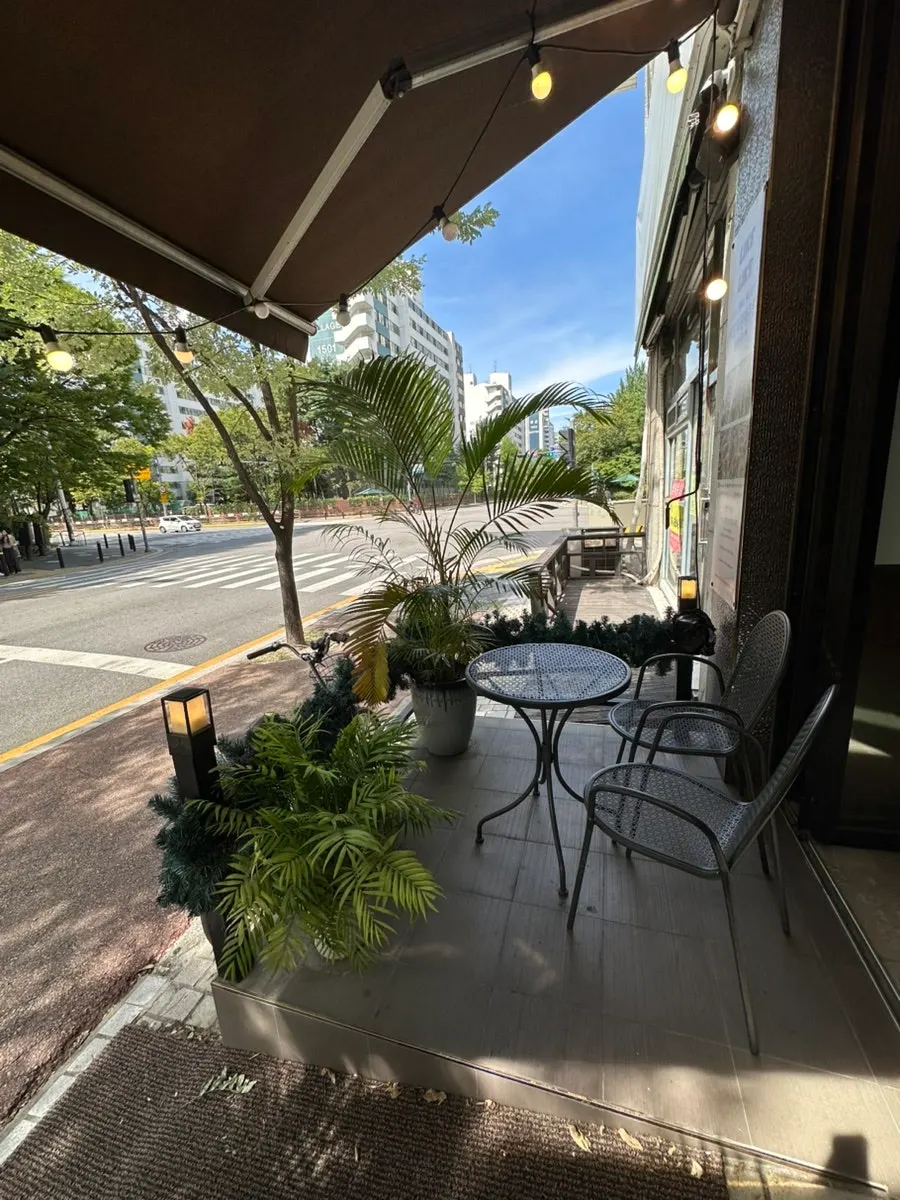 Exterior of Like Like Ilsan Juyeop Branch with plant decorations
