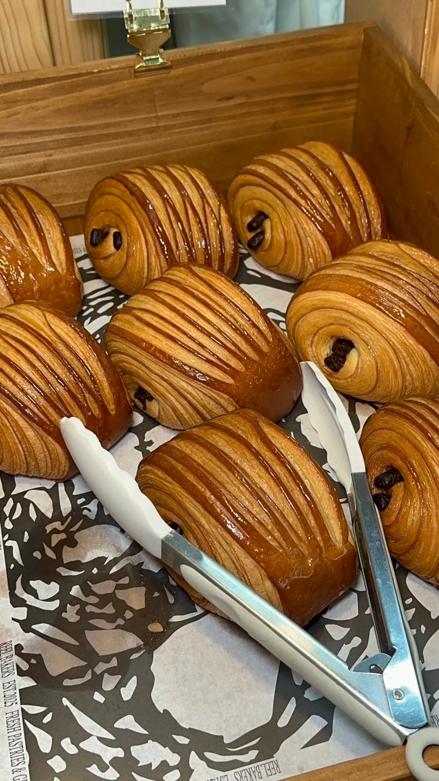 Raspberry chocolate pastry and other desserts on display