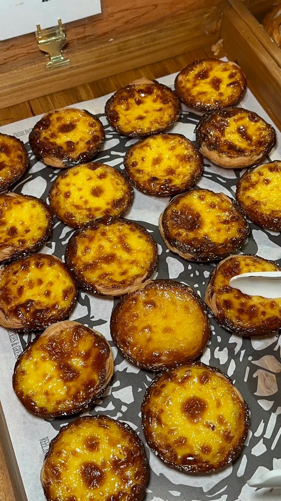 Bakery display case with egg tarts