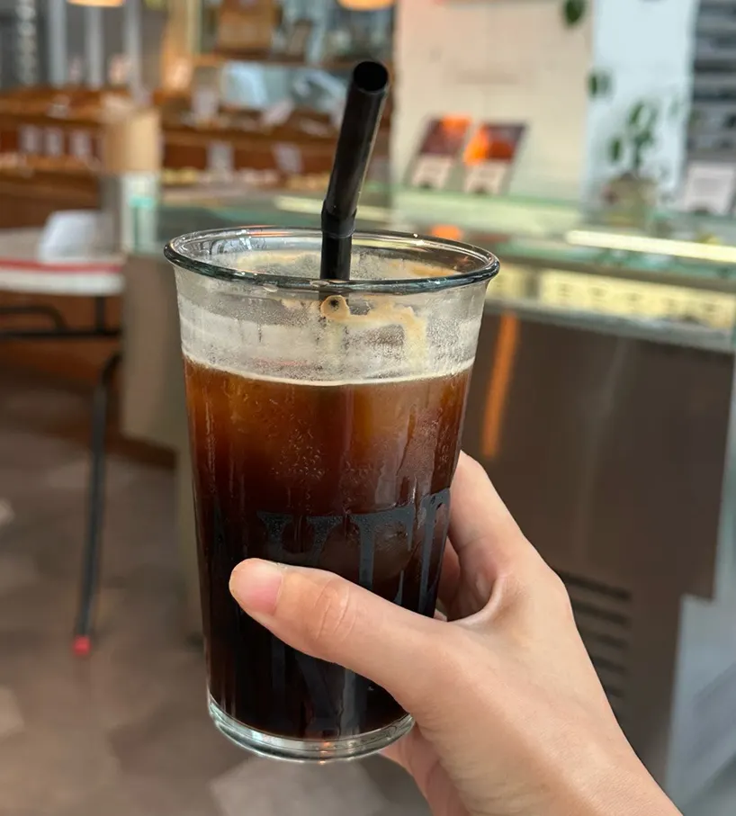 Americano served alongside dessert