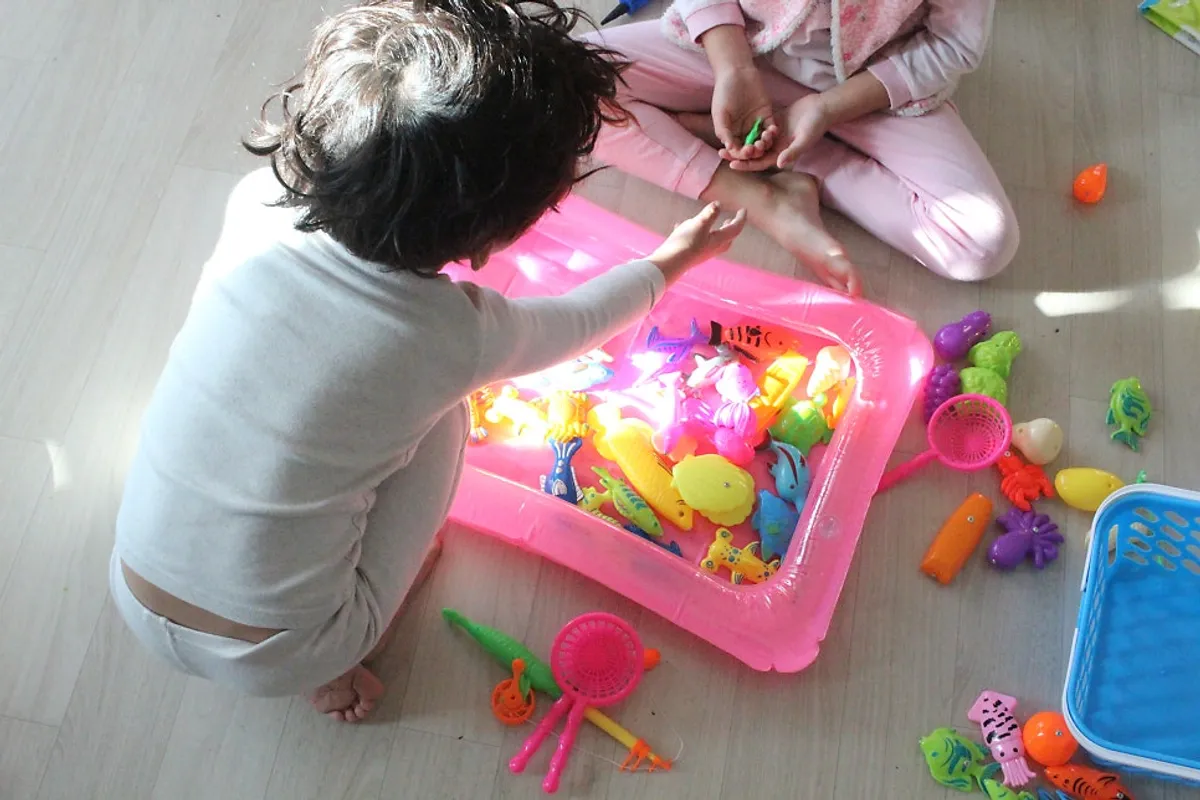 Magnetic fishing game on the inflatable mat