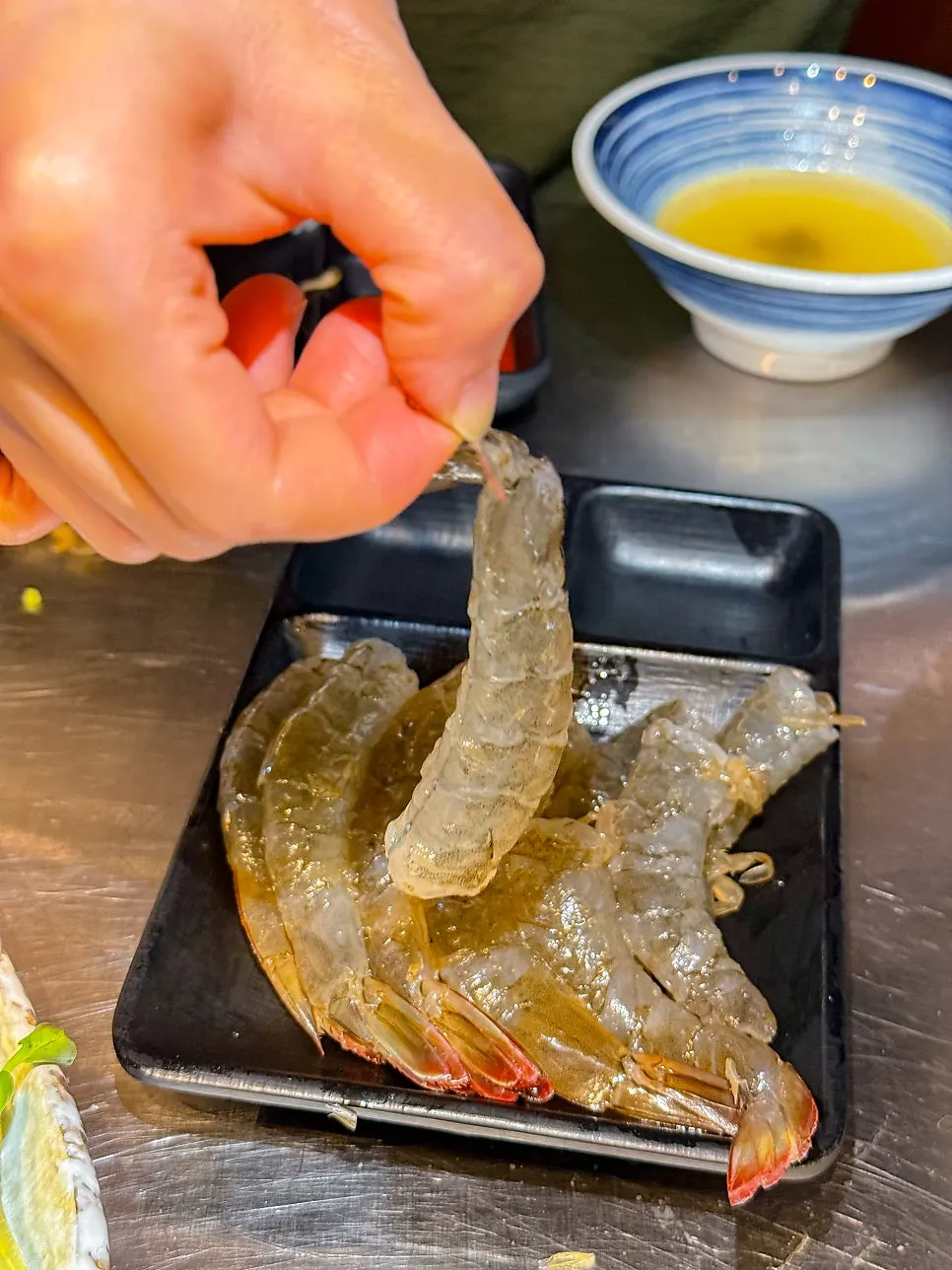 Close-up of bouncy raw shrimp sashimi