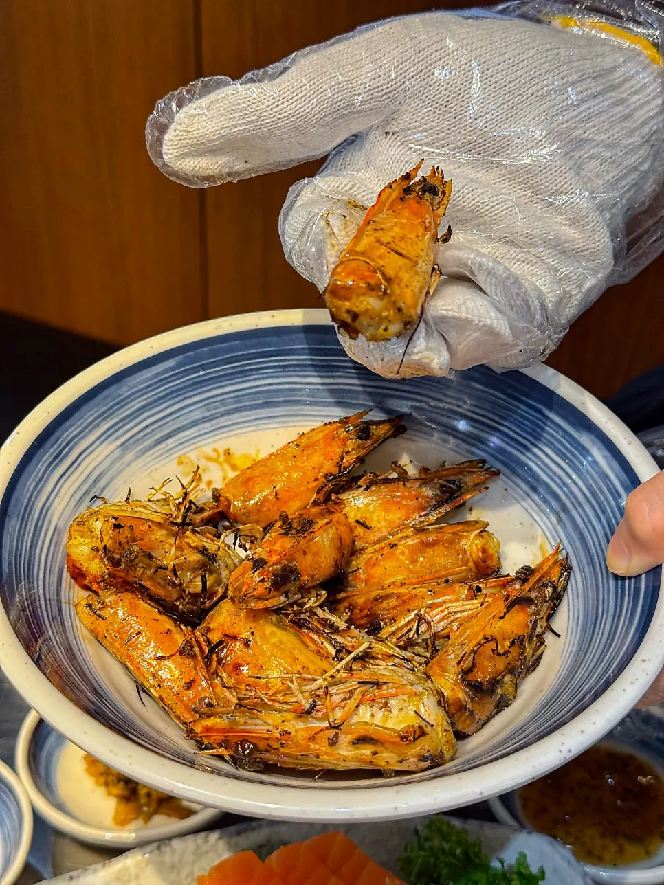 A plate of grilled shrimp head butter