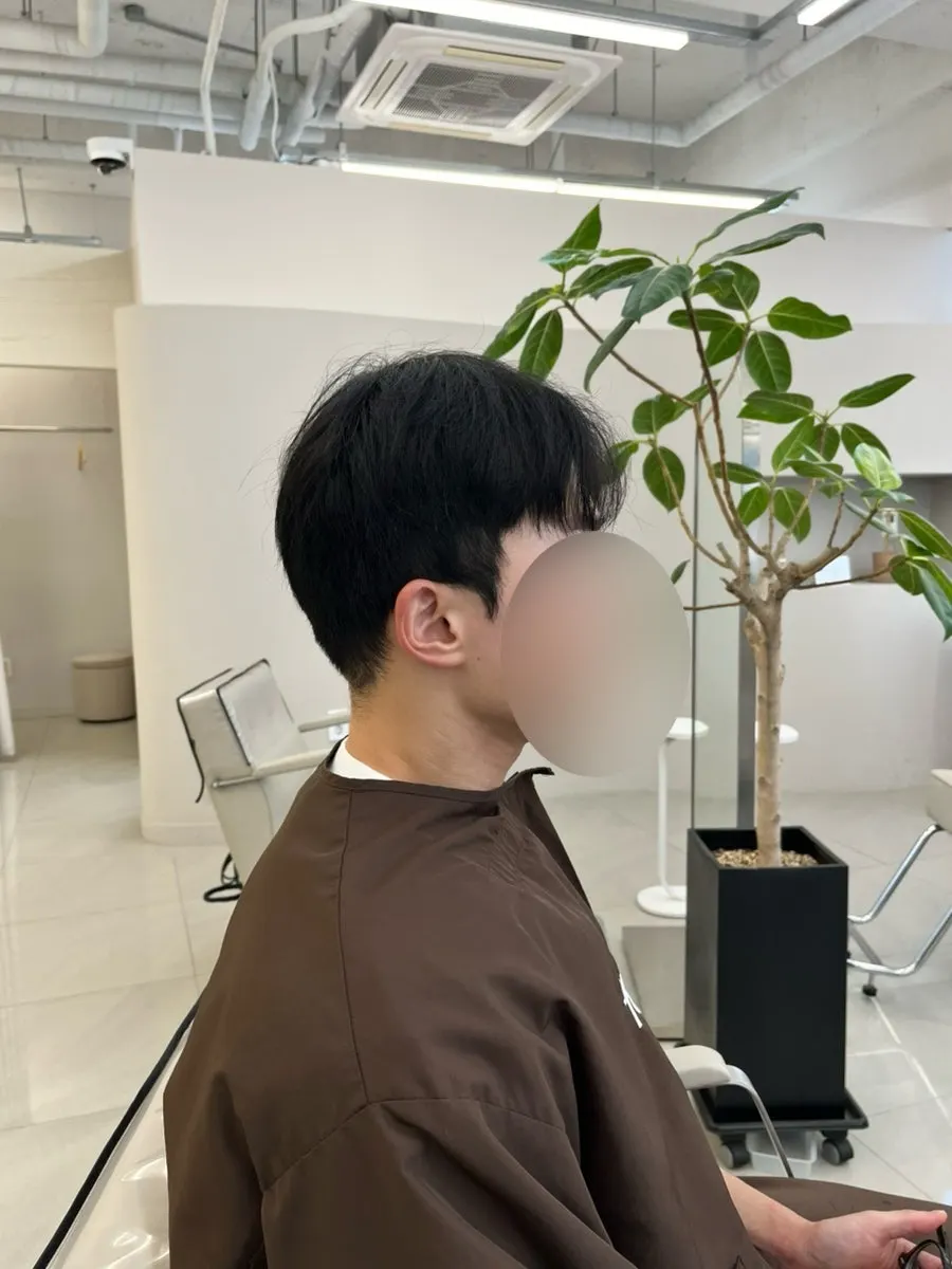 Neckline and sideburns grown out before the cut