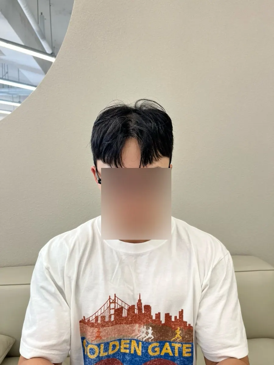 Side view of the finished men's haircut