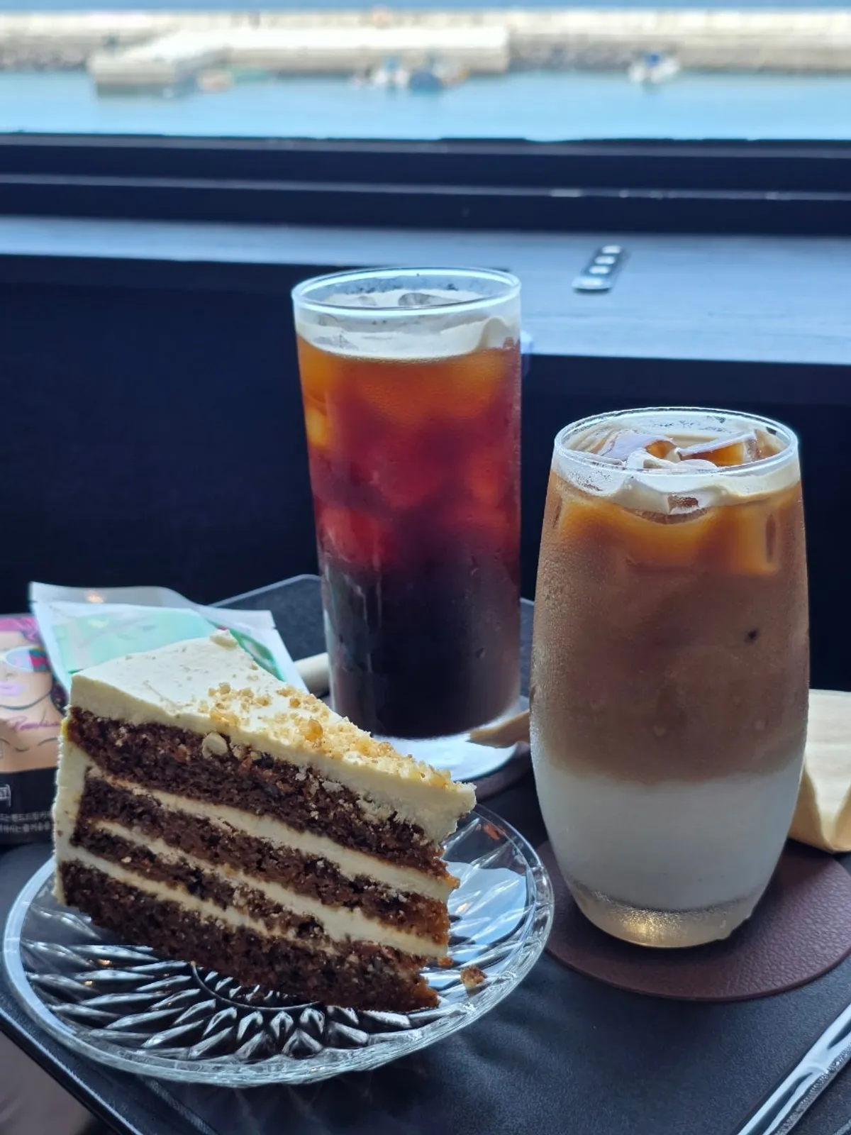Exterior view of Robain Coffee, an oceanview café in Sinchon-ri, Jocheon-eup, Jeju
