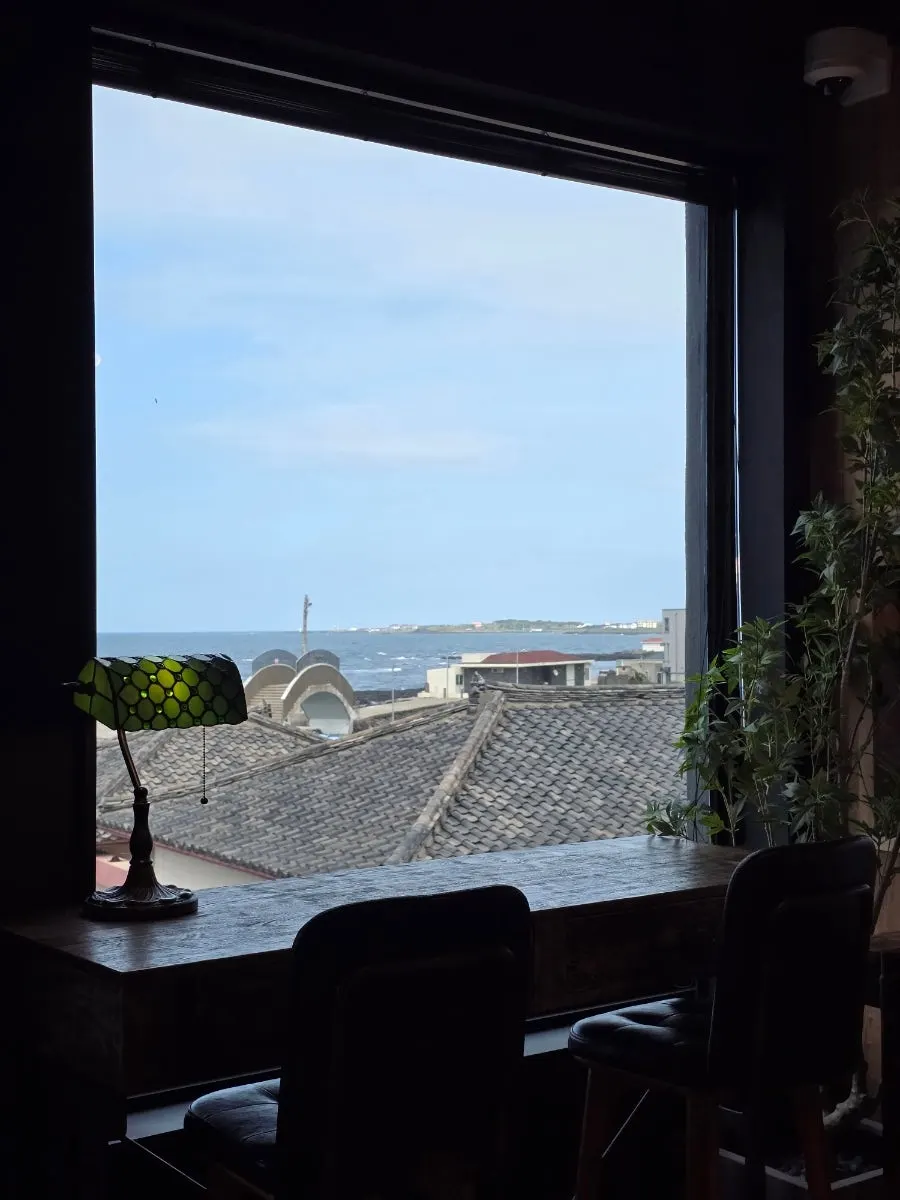 Café view with the sea visible in front of Keunmul Port in Sinchon-ri