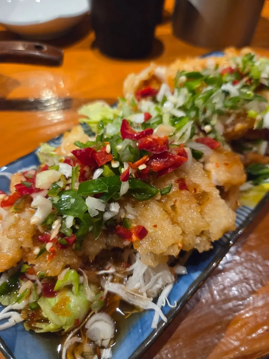Yurinki served over a generous bed of vegetables