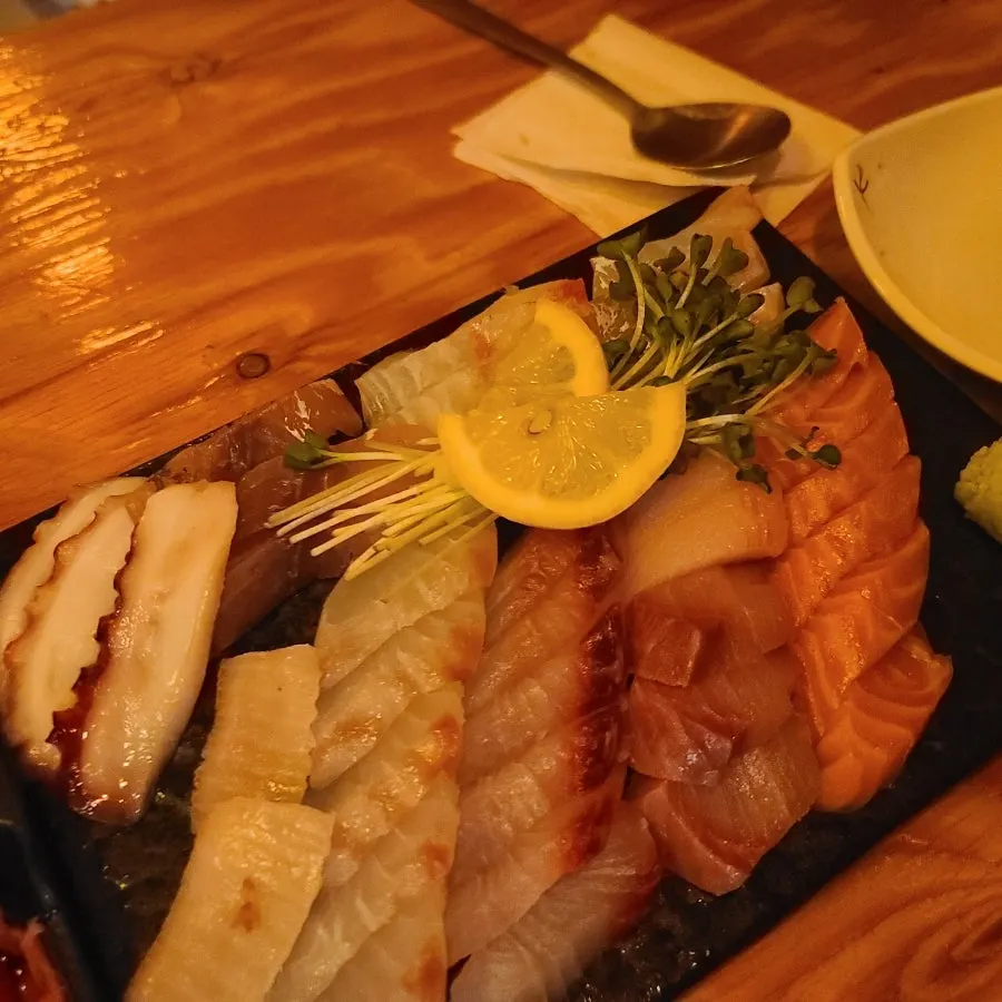 Mixed sashimi with salmon, flounder, and boiled octopus