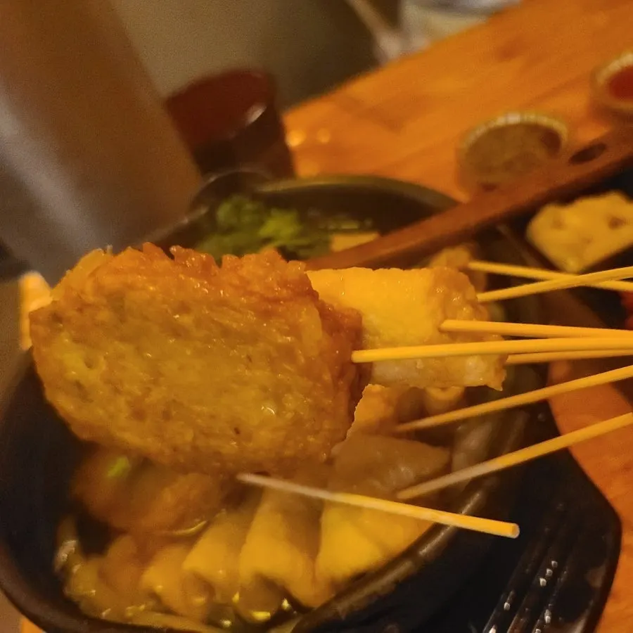Earthenware oden hot pot packed with skewer fish cakes