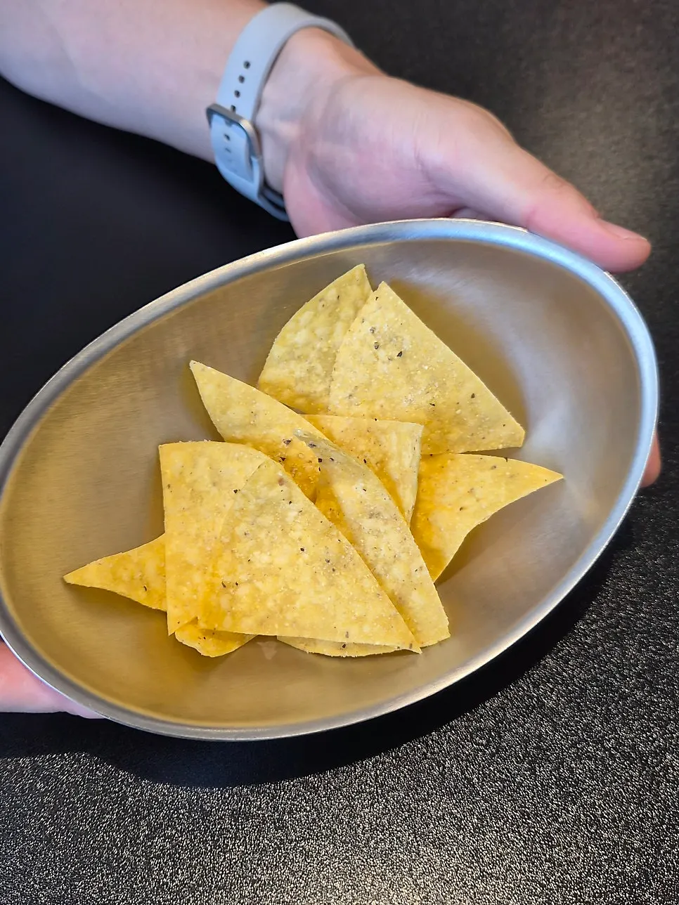 Free house-fried nachos provided as a complimentary starter