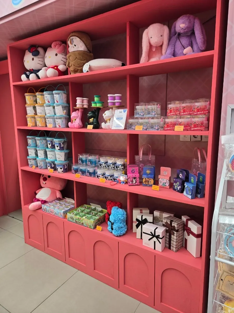 Display case of jellies in various shapes and colors