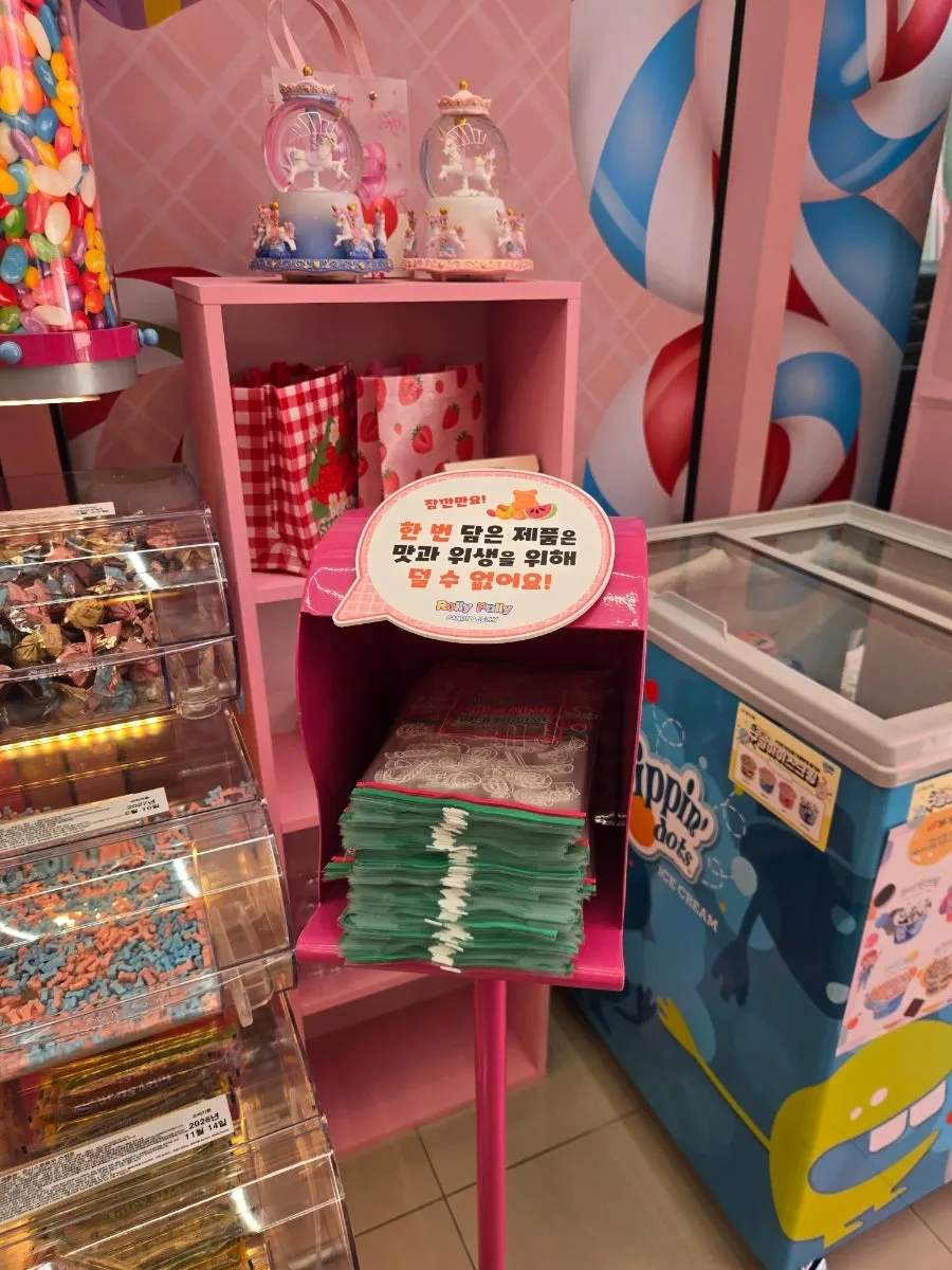 Picking out snacks inside the Rolly Polly shop