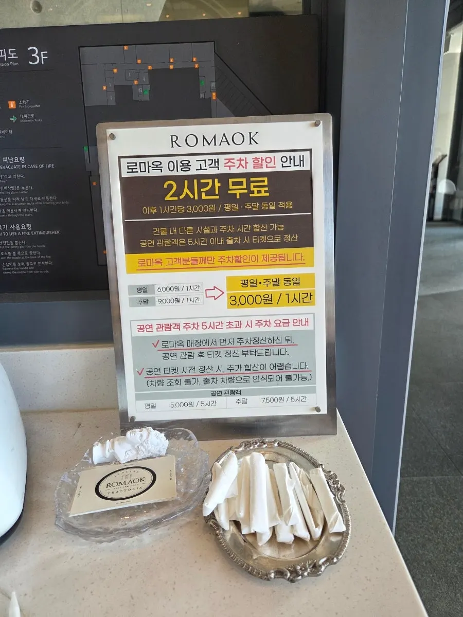 Business cards and wrapped toothpicks at the register