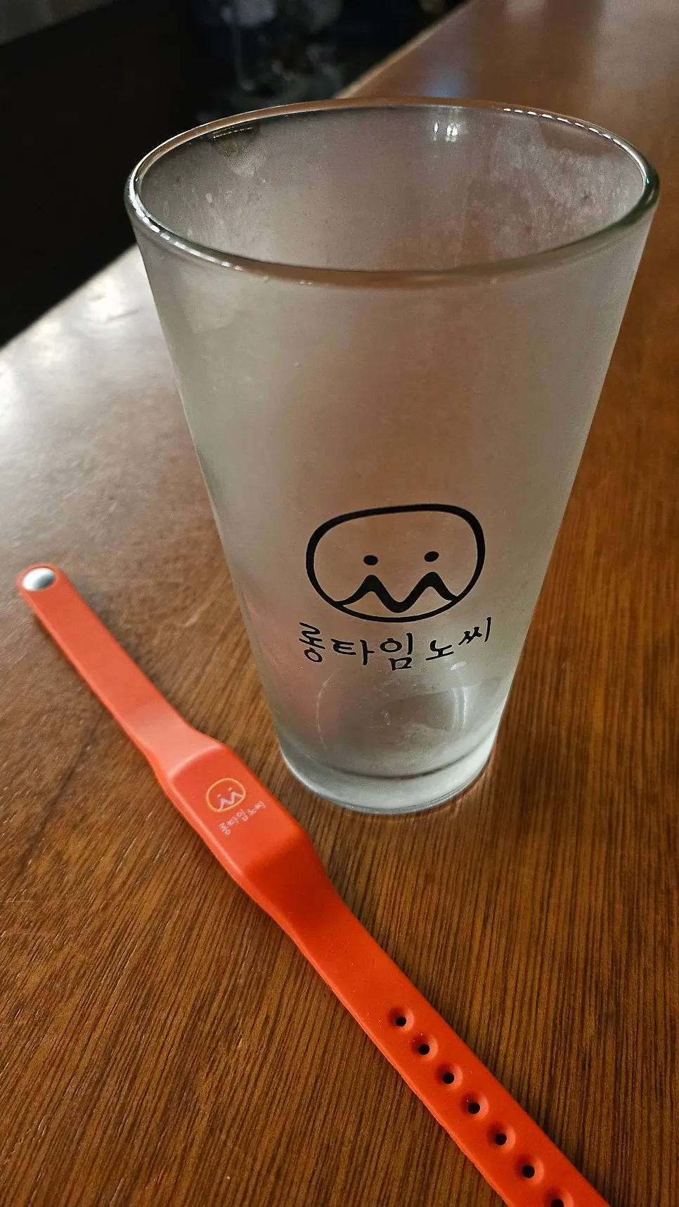 A rack of self-serve beer glasses