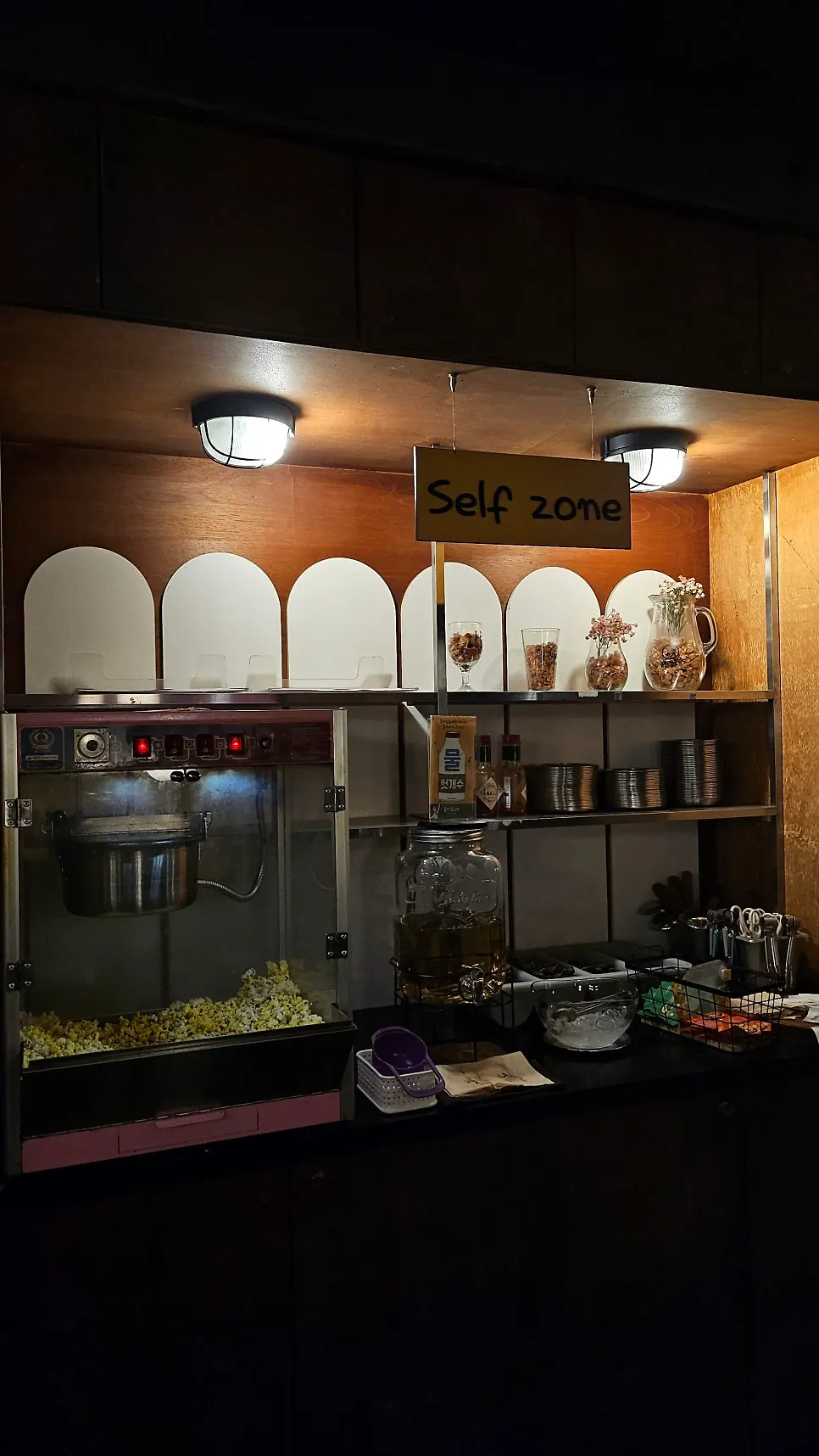 A self-zone where guests can refill their popcorn