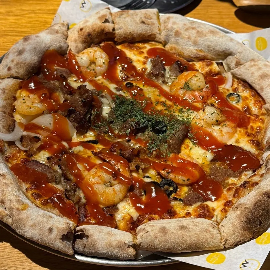 Bulgogi shrimp pizza topped with shrimp and bulgogi