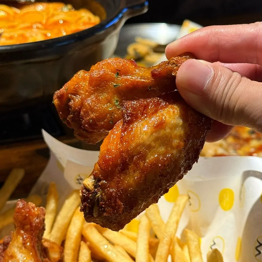 Chicken and fries served with two dipping sauces