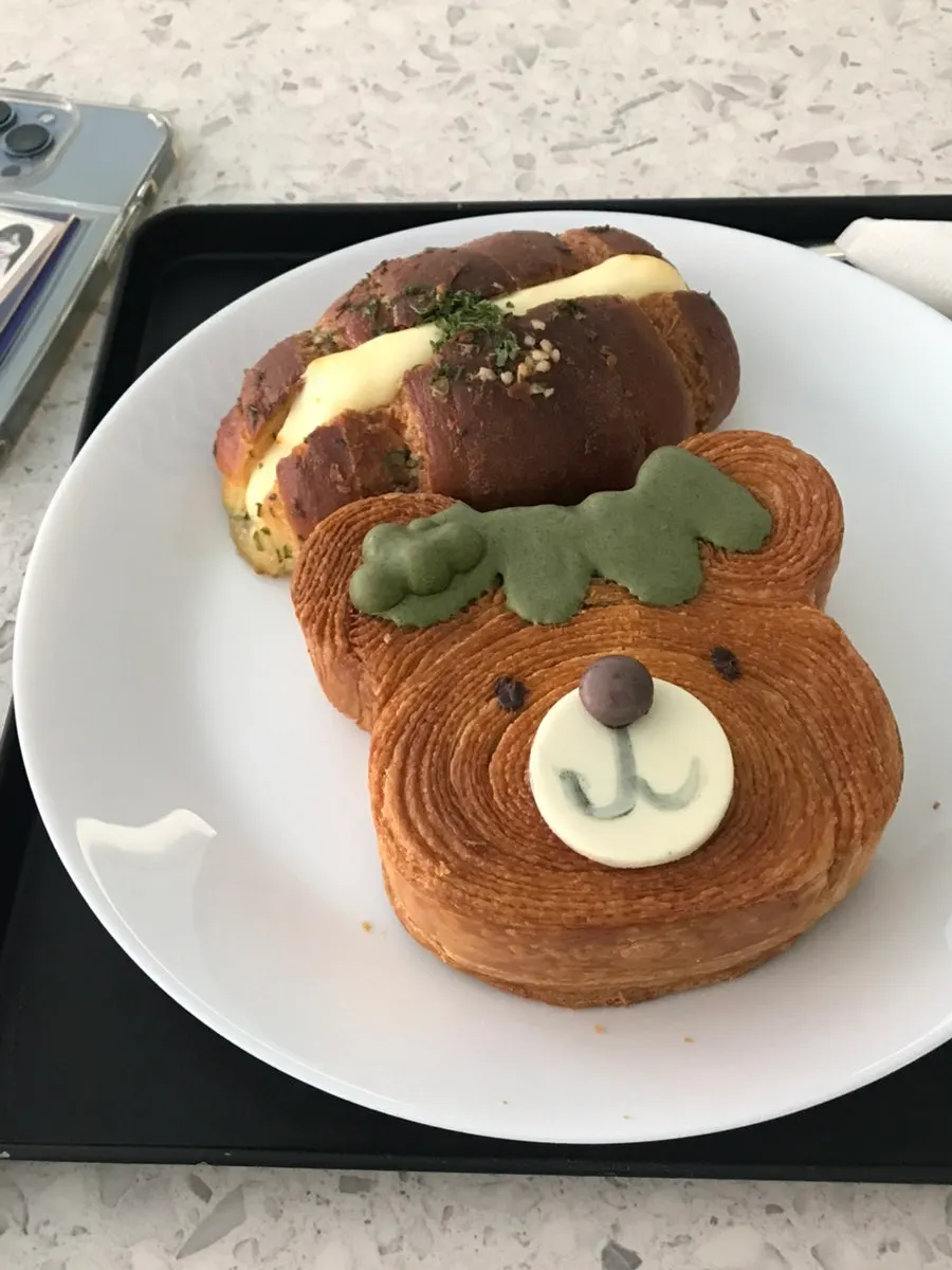 Matcha cream bear pastry cut in half