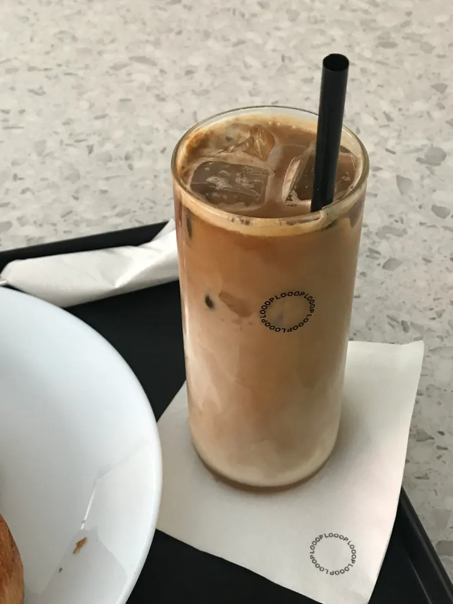 Iced latte made with soy milk