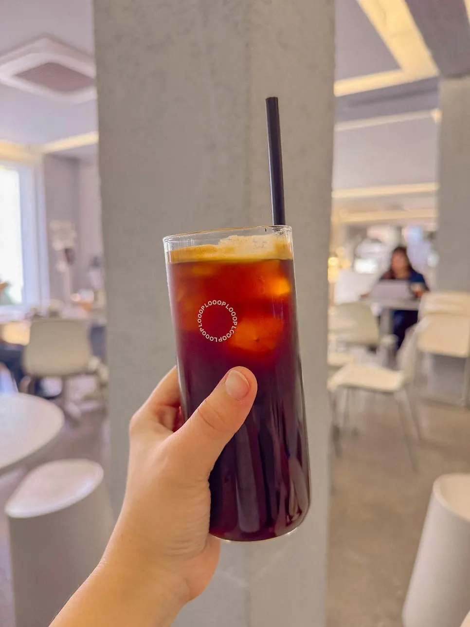 Close-up of LOOOP Bakery's americano cup