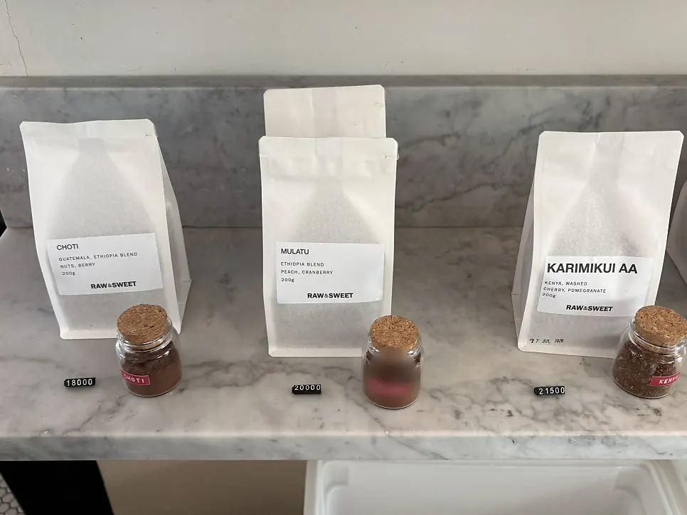 Coffee bean packages sold at Low & Sweet