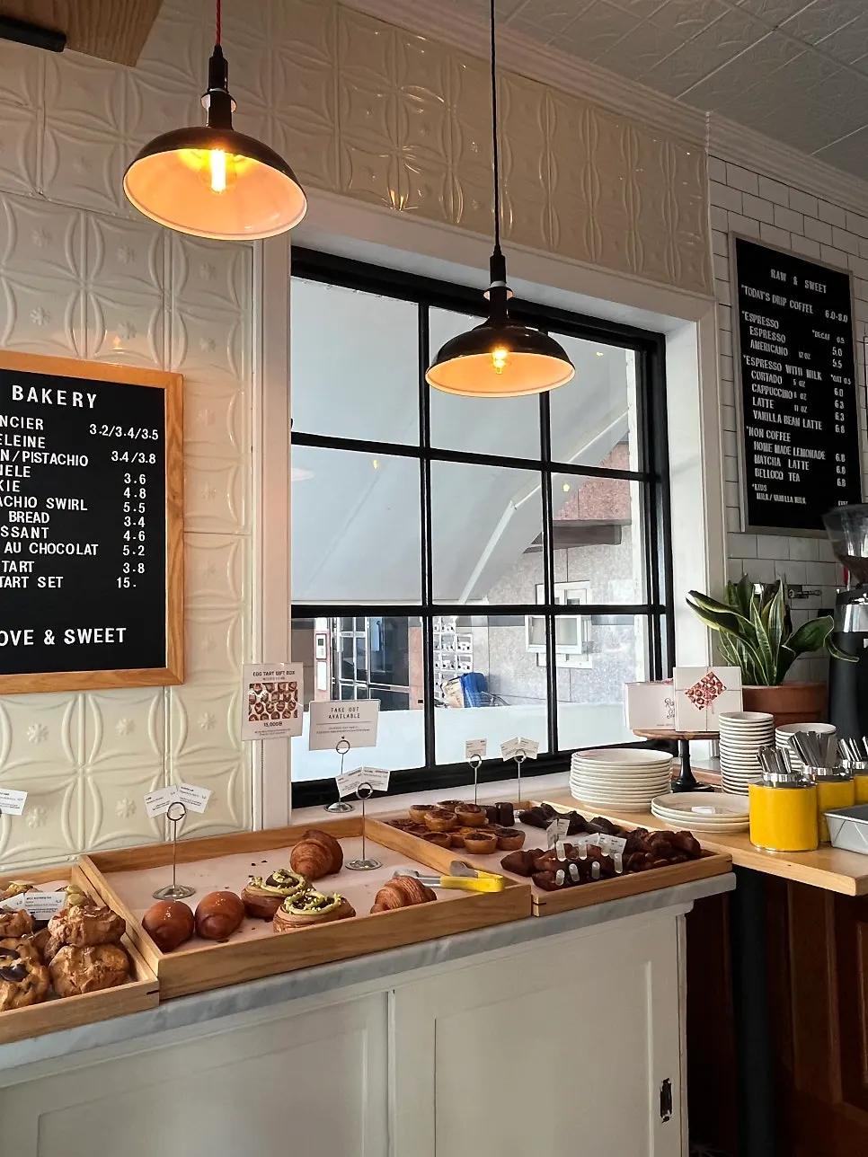 Breads and baked goods displayed on the bakery shelf