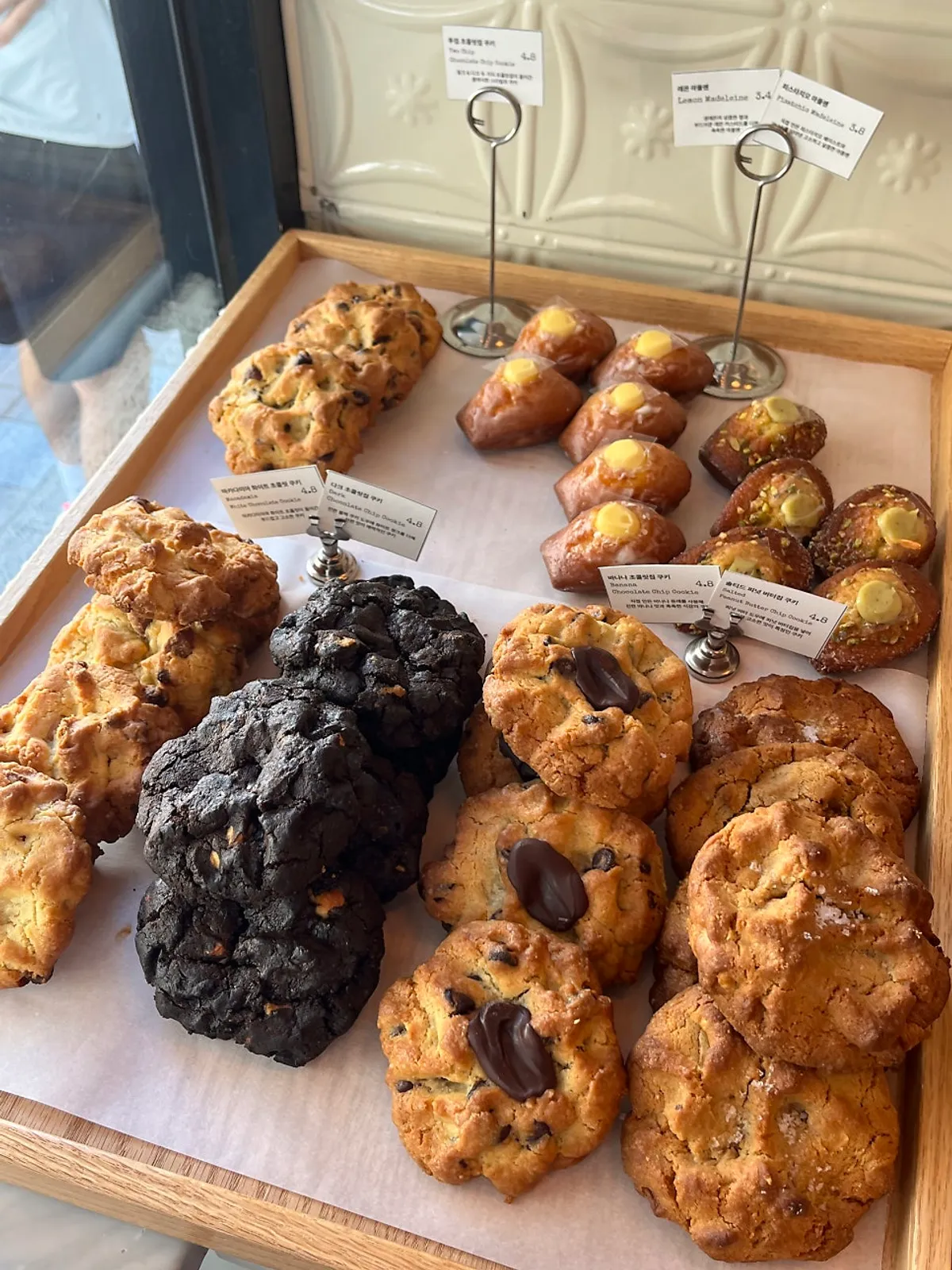 Scones and financiers displayed at Low & Sweet Bakery