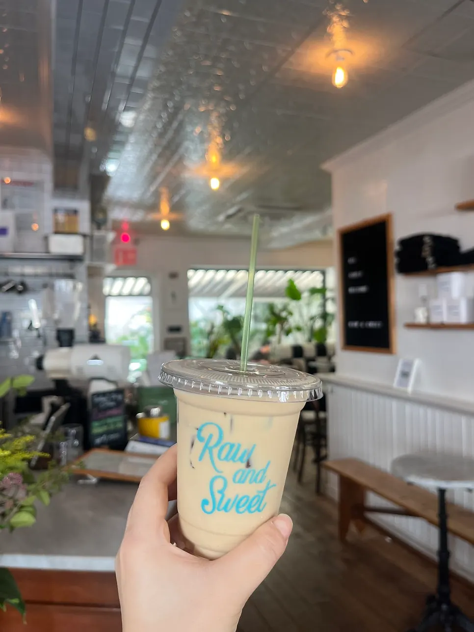 A latte served in a pretty cup