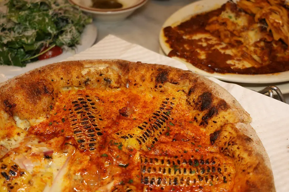 Close-up of the truffle cream base corn pizza